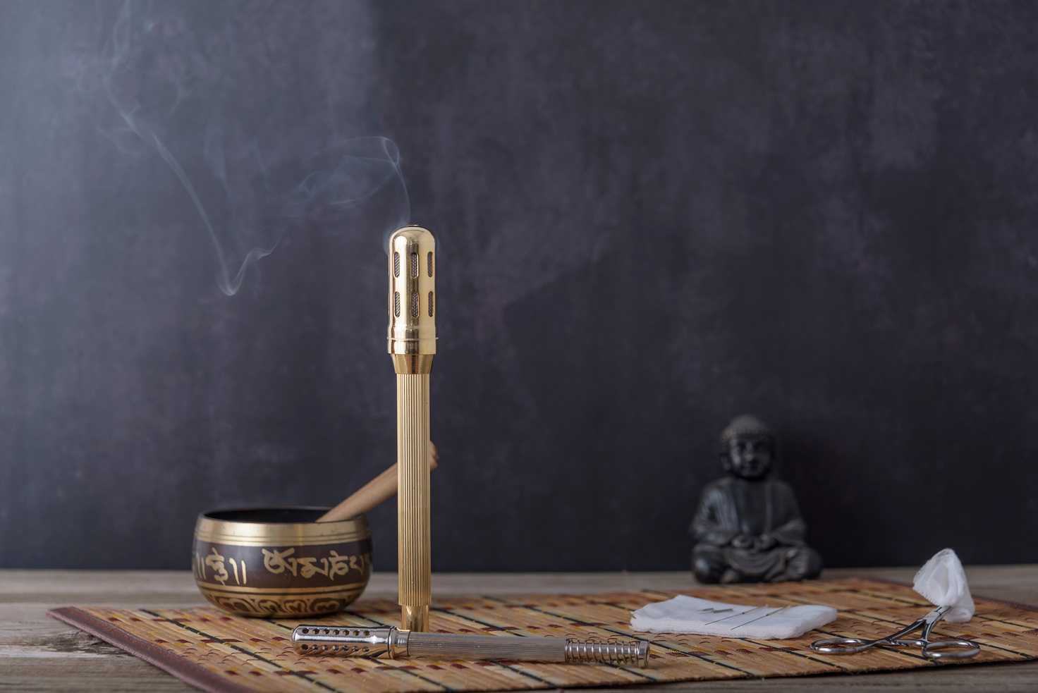 Alternative Therapist Applying Moxibustion a Traditional Chinese Medicine Method. Doctor Healing Young Patient with Traditional Asian Medicine. Moxa Stick Alone.  Close up. Moxibustion.