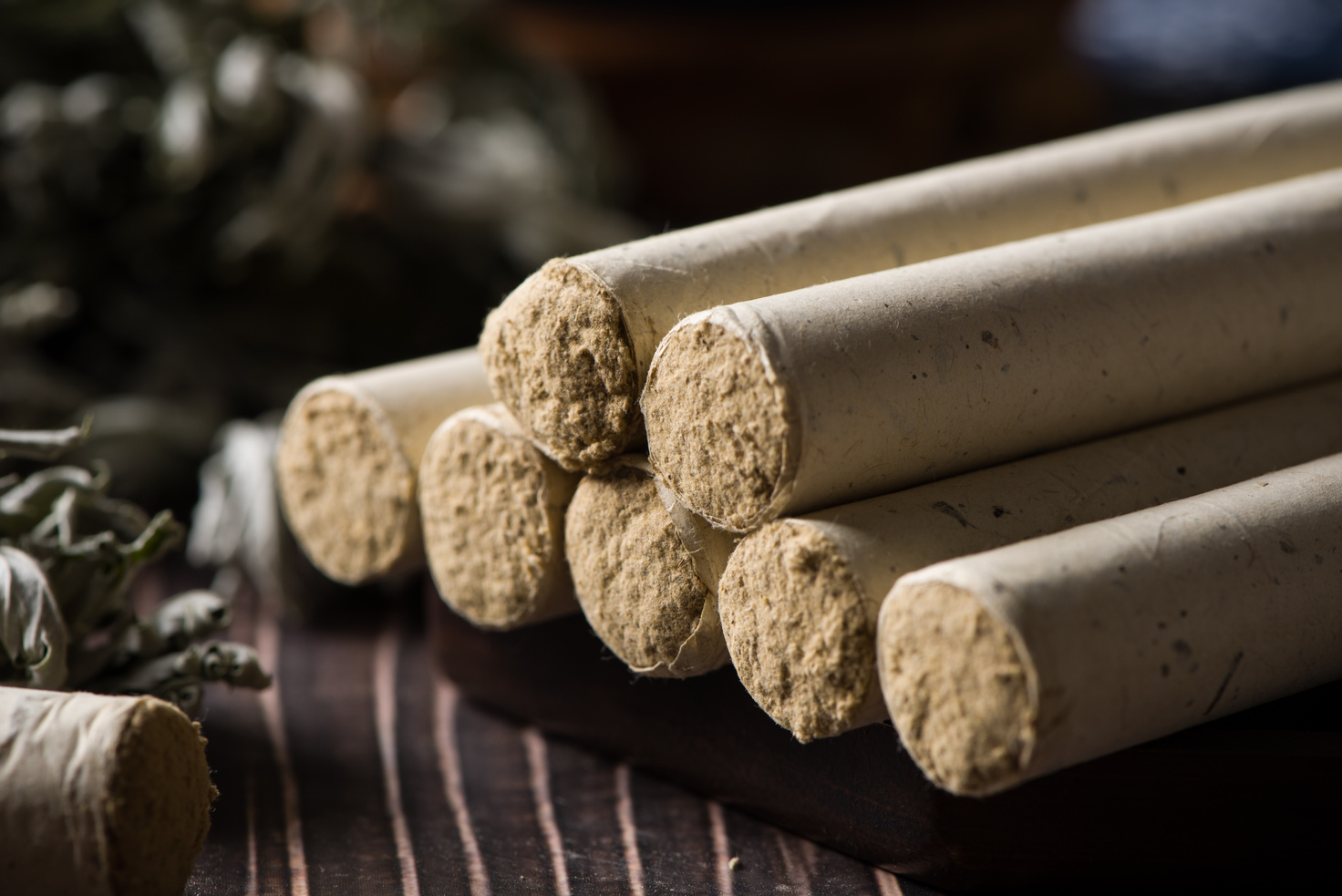 Chinese tradition moxa moxibustion sticks on a wooden table