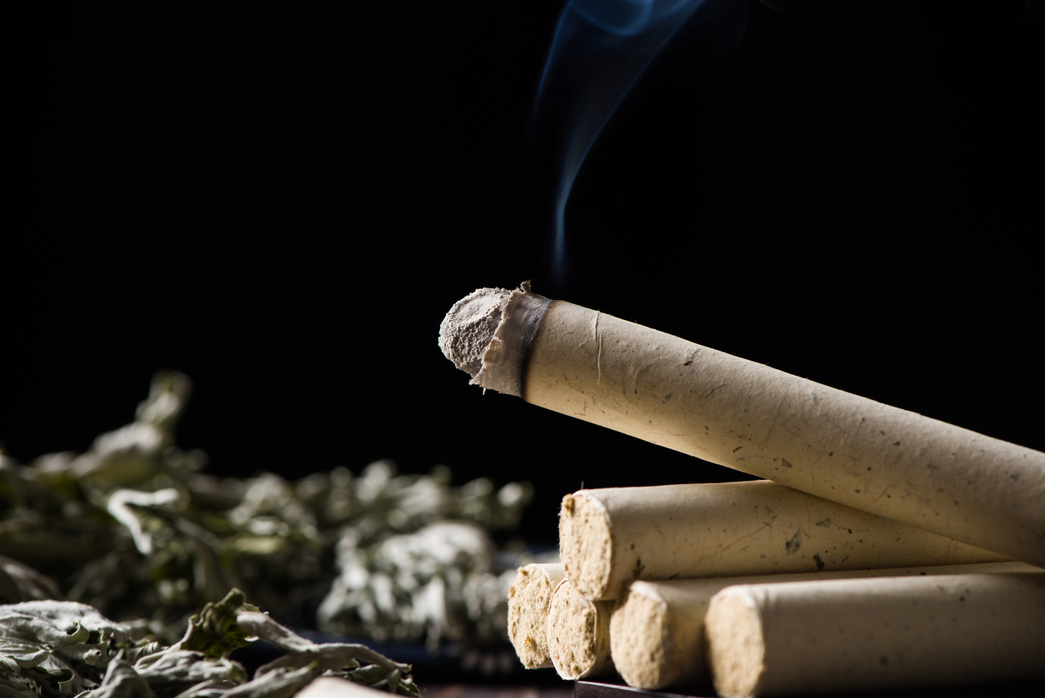 Chinese tradition moxa moxibustion sticks on a wooden table