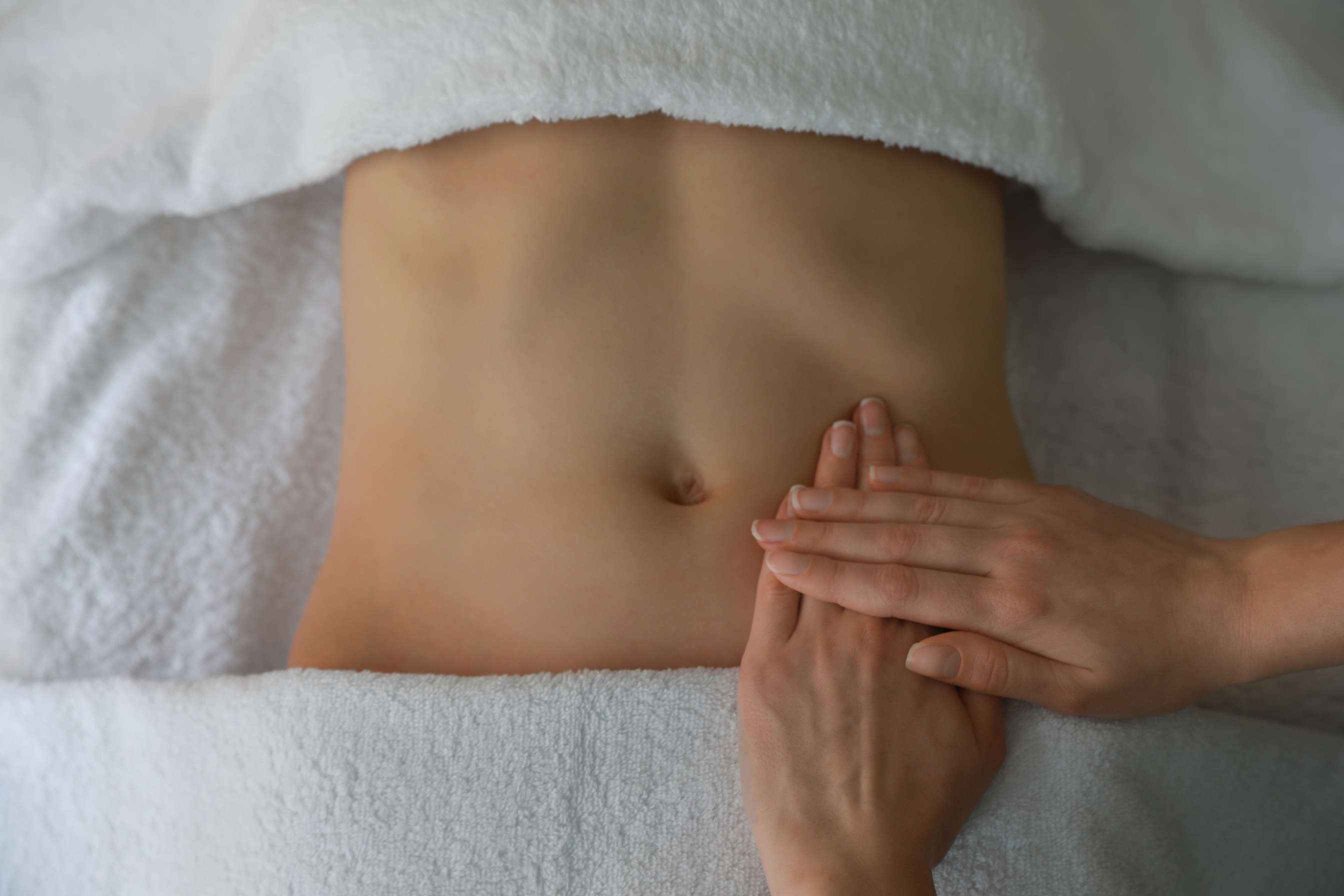 Woman Receiving Professional Belly Massage, Closeup View